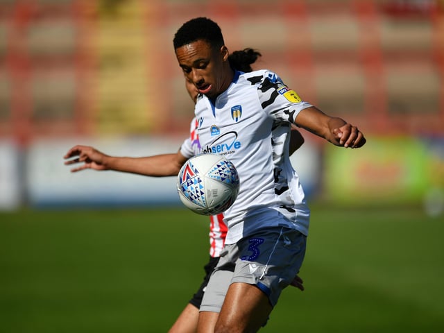The Colchester left-back has joined Michael Appleton's side on a 'multi-year deal'. The Imps also landed Brighton's Max Sanders for an undisclosed fee. Heading out was defender Max Melbourne, who has joined Walsall. Picture: Dan Mullan/Getty Images