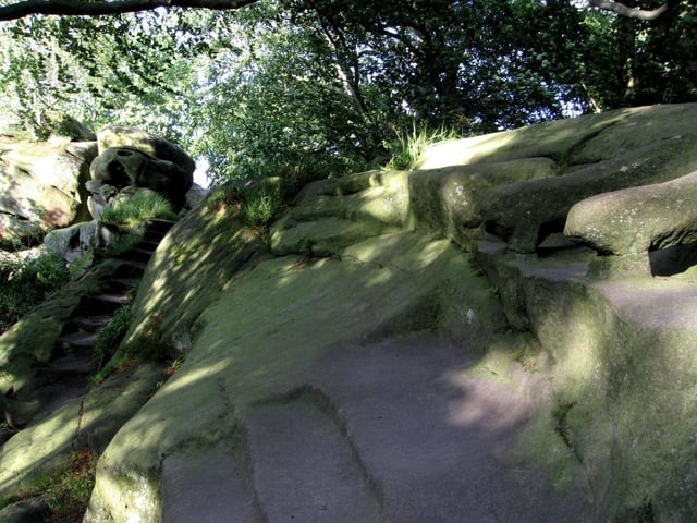 The Rowter Rocks at Birchover have caves, rooms, tunnels, steps and even an armchair carved into the stone. Victorian tourists were lead to believe these were the work of an ancient Druid community - but were carved by a local man some 300 years ago.
