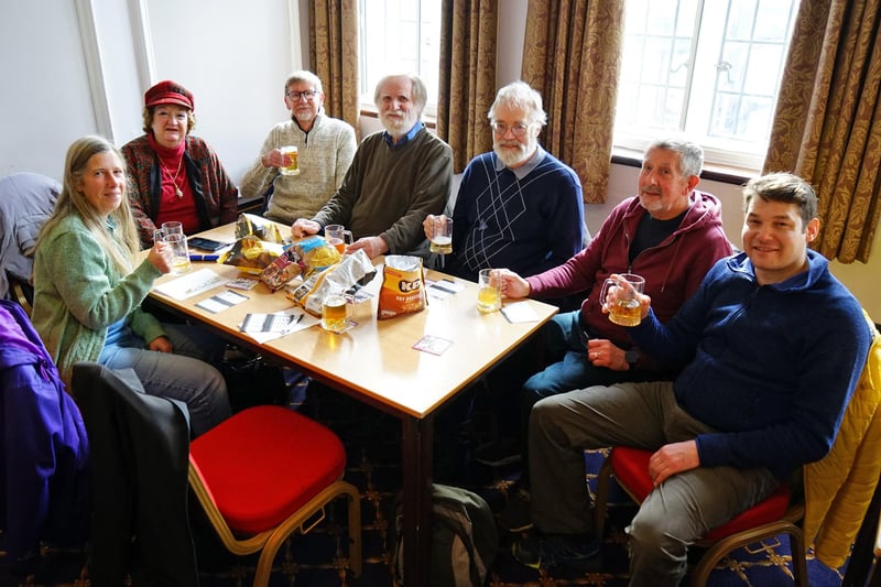 A group of friends enjoying the ales in the function room.