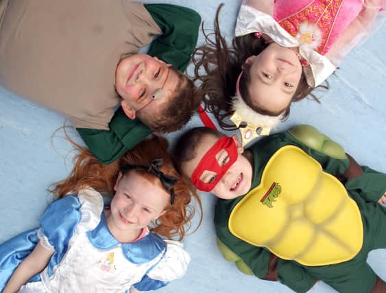 Ellie Parnham (Alice), Kian Johnson (Troll),  Maisie Bell (Sleeping Beauty) and Thomas Foxall (Turtle), pictured clockwise from left at Clay Cross Infants School in 2007.