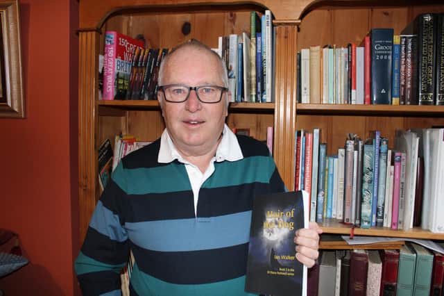 Ian Walker with his latest book, Hair of the Dog.