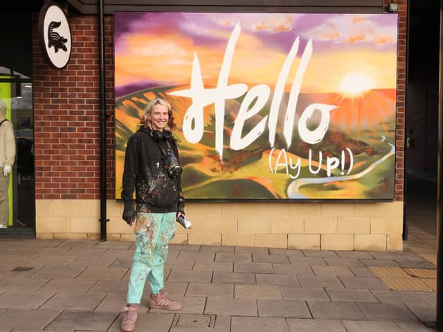 Peachzz with the new murals at the East Midlands Designer Outlet, South Normanton.