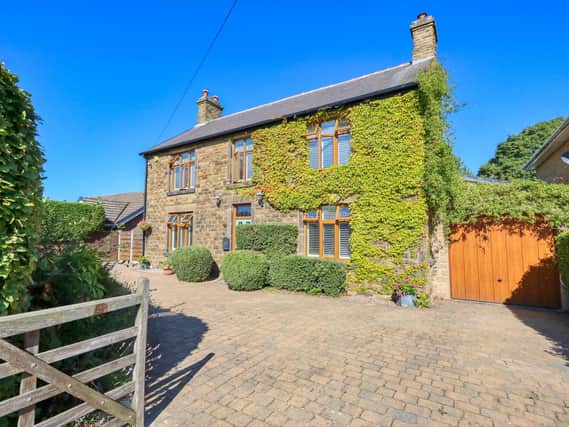The detached house is situated on a generous plot on Nethermoor Road.