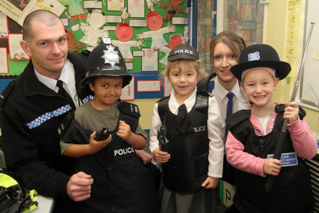 Pc Paul Malyon and PCSA Calia Millwaters with pupils Ryan Millen, Alice Raybould and Lara Flett at Poolsbrook School where the officers gave a talk.
