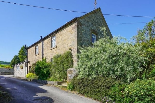 The property is typical of the 'long house' style found in farming villages in the Derbyshire Dales.