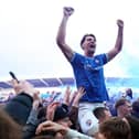 Joe Quigley celebrates Chesterfield's promotion. (Photo by Cameron Smith/Getty Images)