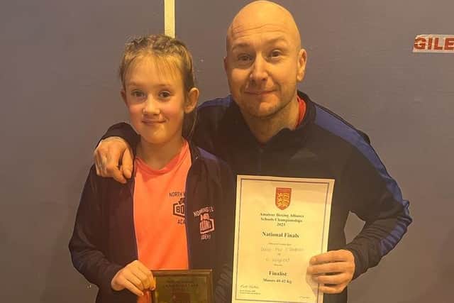 Darcie is pictured with coach Stuart James.