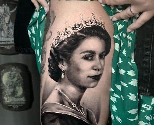 The unique tattoo featuring Her Majesty The Queen has been done by Alessio Catazani at a Chesterfield Tattoo Studio (Credit: Holy Spirit Tattoo Studio)