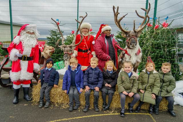 Spinkhill pupils have had an amazing festive surprise as real reindeers and Santa Claus visited thier school.