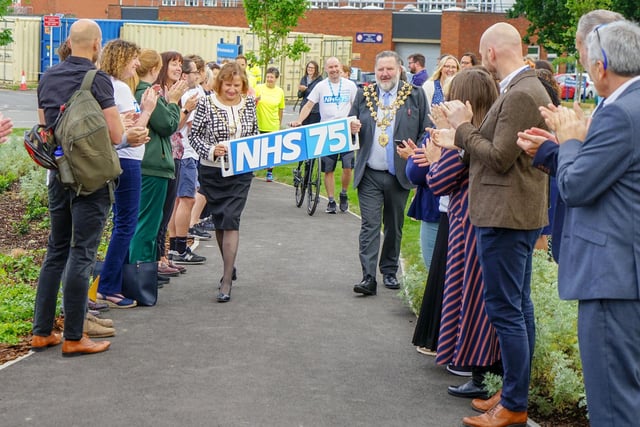 Chesterfield Royal Hospital opens its 'Wellbeing Hub' following an opening ceremony featuring an NHS75 baton relay across the hospital site.