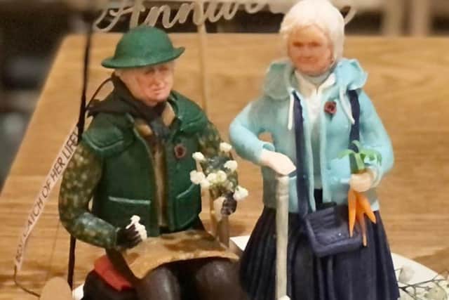 The models of Colin and Dorothy Hicklin which decorated the top of their celebration cake.