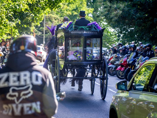 The horsedrawn carriage carrying the coffin of 16-year-old Louise Smith passing 100’s of bikers on Middle Park Way. Picture: Habibur Rahman