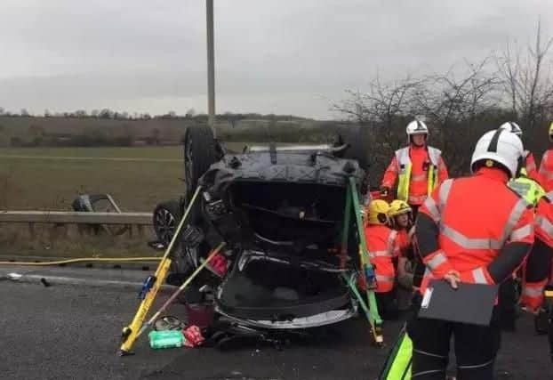 The scene on the A605 where the car overturned - Photo @roadpoliceBCH