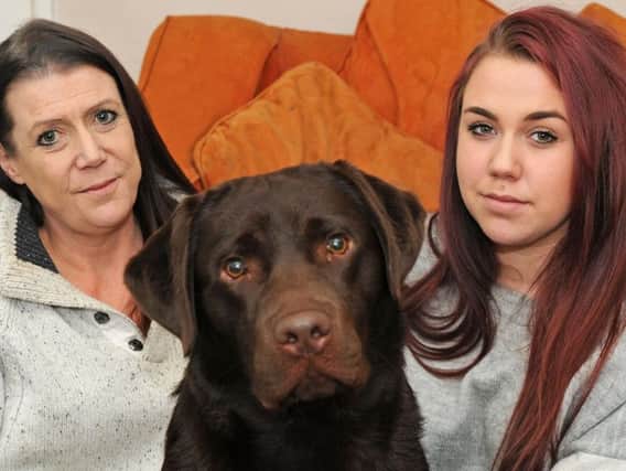 Natasha Clarke, pictured right, with her mum Clare and dog Bailey. Picture: Anne Shelley.