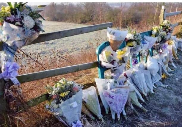 Floral tributes left at the scene of the crash.