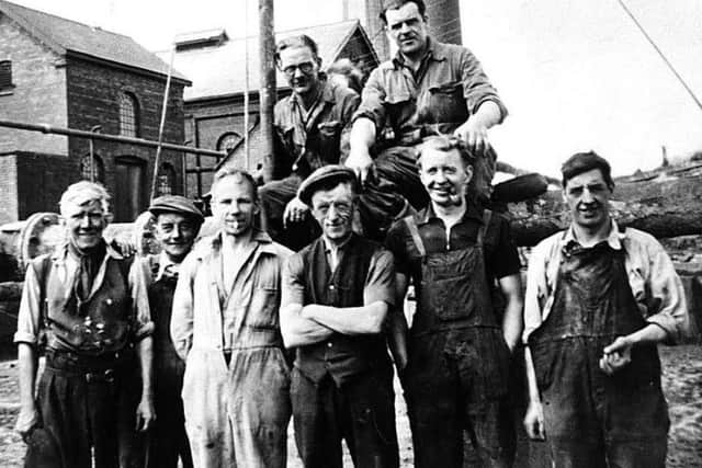 Alfreton Colliery Workers on Meadow Lane, Alfreton, c1940. Credit: D Wright.