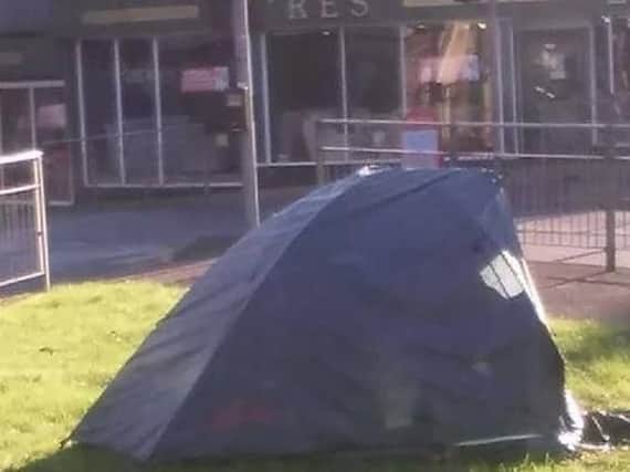 A tent has appeared in the middle of a busy Chesterfield town centre junction.