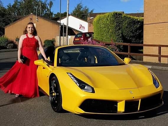Nicole Lander with the Ferrari. Picture provided by Kim Holden.