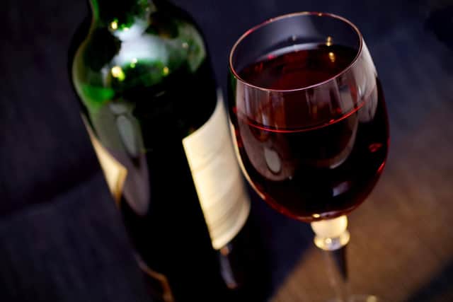 Many petrol stations are licensed these days so you can't go wrong with a bottle of plonk! But don't go for the cheapest.