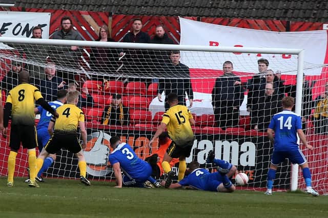 Match action from Pinxton v Hucknall in Sunday's CMFL Buckingham Insurance League Cup final.