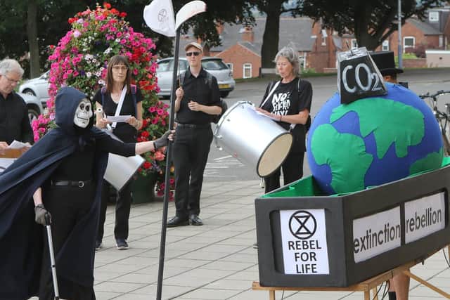 Climate change campaigners in Chesterfield before the council debate.