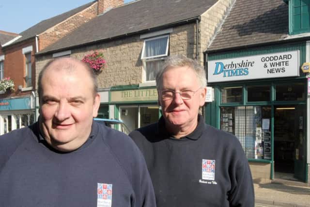 Chris White, left, and Mick Goddard, right, outside their shop in 2008.