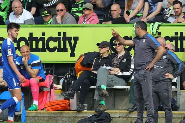 Jack Lester has words with Joe Rowley after substituting the youngster at Forest Green.