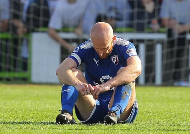Picture by Gareth Williams/AHPIX.com; Football; Sky Bet League Two; Forest Green Rovers v Chesterfield FC; 21/04/2018 KO 15:00; The New Lawn; copyright picture; Howard Roe/AHPIX.com; A devastated Drew Talbot after defeat at Forest Green
