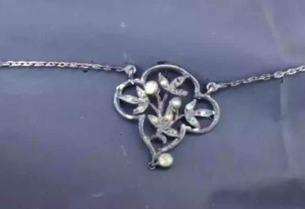 The necklace the woman was found wearing