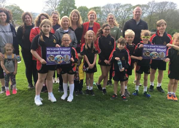 Pupils, parents and staff at St Peter and St Paul School in Chesterfield on the run for Bluebell Wood Children's Hospice.