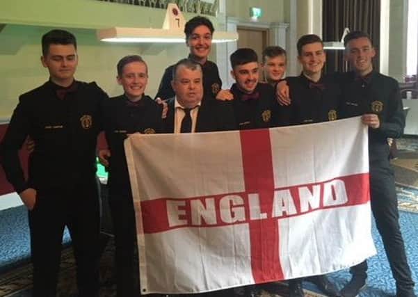 Chesterfield player Calhoun Cronin with the rest of the England team at the World Cup of Pool.