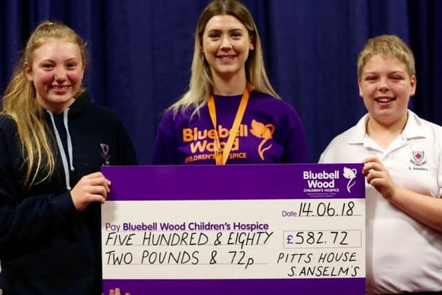 Ss Anselm's School, Bakewell, present a cheque to Bluebell Wood Children's Hospice.