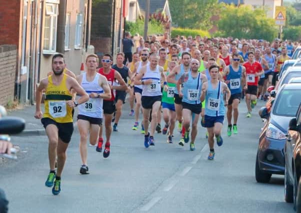 The runners are on their way in the historical Hardwick 10K race.