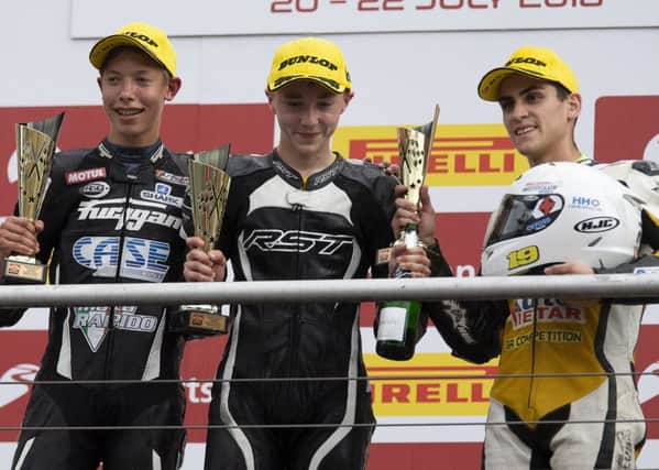 Scott Ogden (centre) on the podium after his victory at Brands Hatch. (PHOTO BY: David Watson)