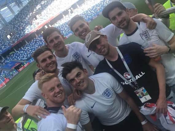 Harry Maguire pictured with friends earlier in the tournament after England's win against Panama.
