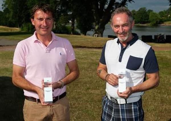 Whitwell amateur golfer Mark Stevenson (right) with his playing partner, Charlie Wallace.