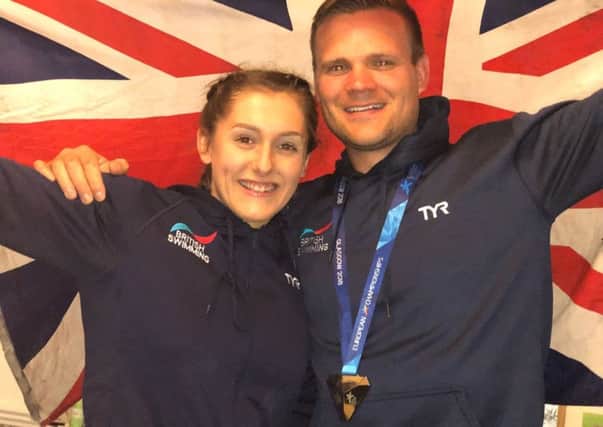 Swimming glory girl Imogen Clark with one of her mentors, Denby-based coach Gordon Watson.