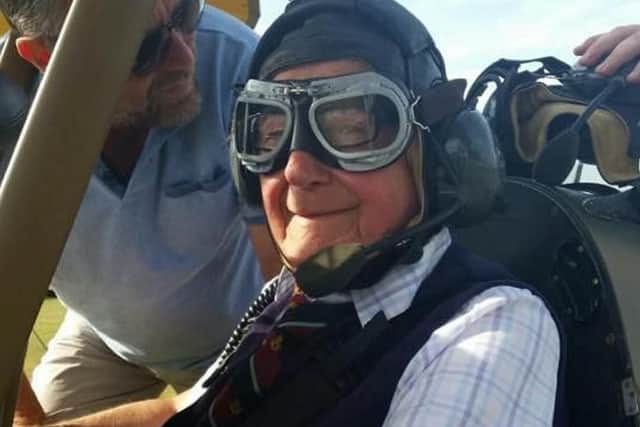 RAF veteran John Watkins returns to the cockpit in a Tiger Moth plane