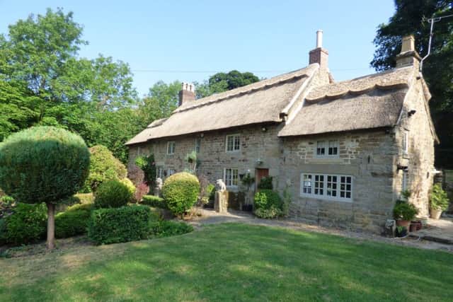 This stunning country cottage is on the market for a guide price of Â£745,000