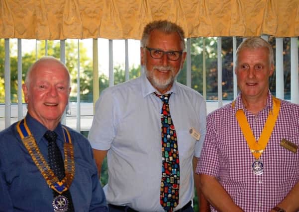 Joint presidents Howard Doran (wiith chain of office) and Trevor Taylor with Glyn Allsop, one of the presidents of Amber Valley Rotary Club.