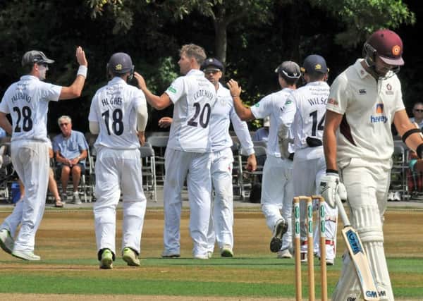 Derbyshire V Northhamptonshire.
Derbyshire bowler, Matt Critchley takes the applause from team mates at the fall of Northampton batsman, Buck, caught by Billy Godleman for 12.