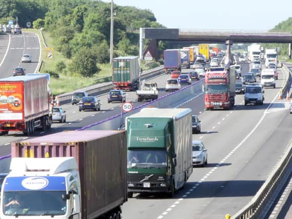 One lane is currently blocked on the M1
