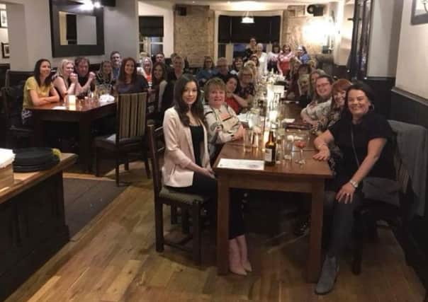 Specsavers' employees are treated to celebratory meal to mark their long service.