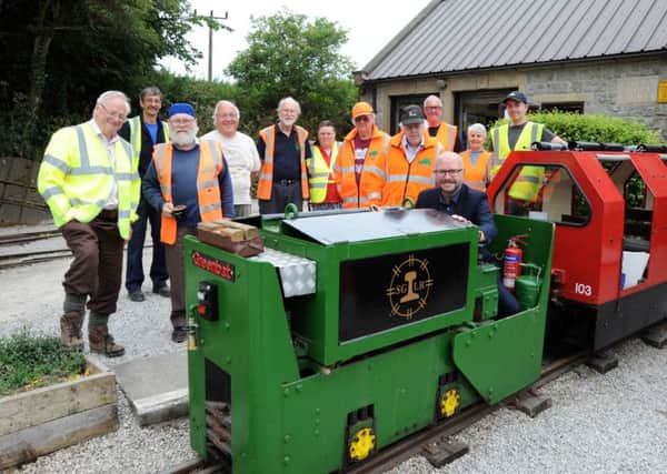 Steeple Grange Light Railway feature. Head of Content, Ashley Booker with the team of volunteers at the Steeple Grange Light Railway in Wirksworth.