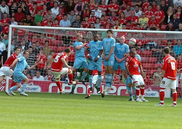 Kieran Tripper scores a late goal for Barnsley against Doncaster Rovers from a free kick in 2011.