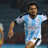 Duane Holmes in action for Huddersfield.