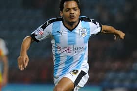 Duane Holmes in action for Huddersfield.