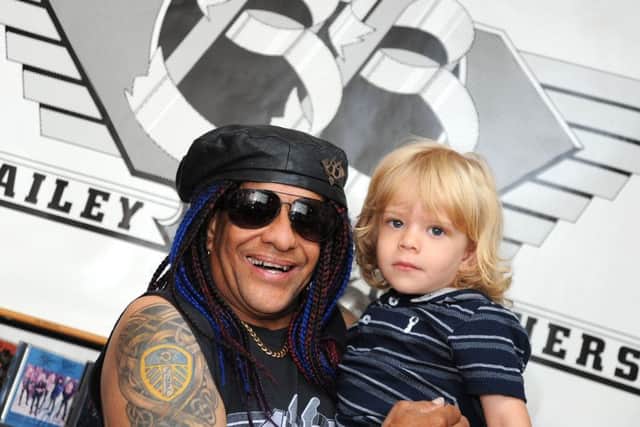 Mick Bailey and his son MJ, who has become a child model.