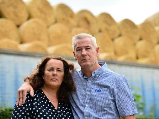 Peter Shaw, 55 and wife Helen, 50, can see nothing but hay bales from their home (Photo: SWNS)