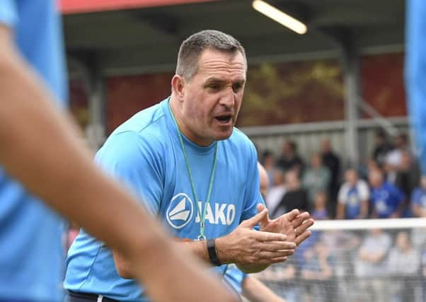 Chesterfield manager Martin Allen puts the players through the warm up before the game: Picture by Steve Flynn/AHPIX.com, Football: Vanarama National League match Salford City -V- Chesterfield at Peninsula Stadium, Salford, Greater Manchester, England copyright picture Howard Roe 07973 739229